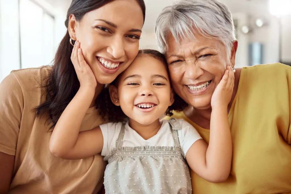 child with mother and grandmother