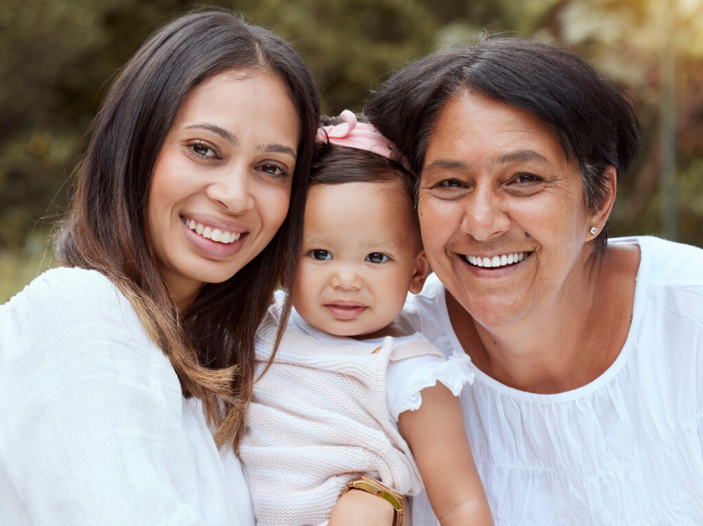 mother-baby-and-family-bonding-outdoor-with-a-smi-2025-04-05-23-43-12-utc child with her mother and her grandmother