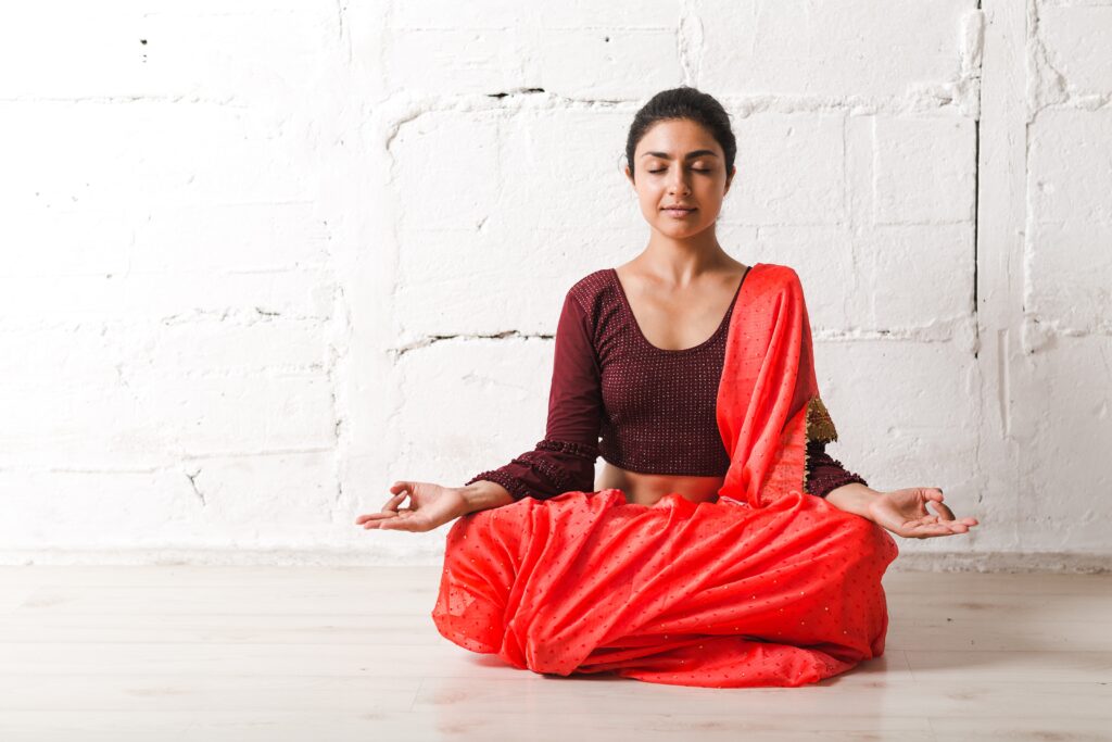 young-adult-indian-woman-in-sari-meditating-yoga-l-2024-11-25-16-47-23-utc mother meditating