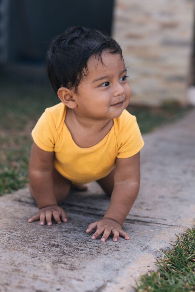 baby crawling on the floor very smiling baby crawing